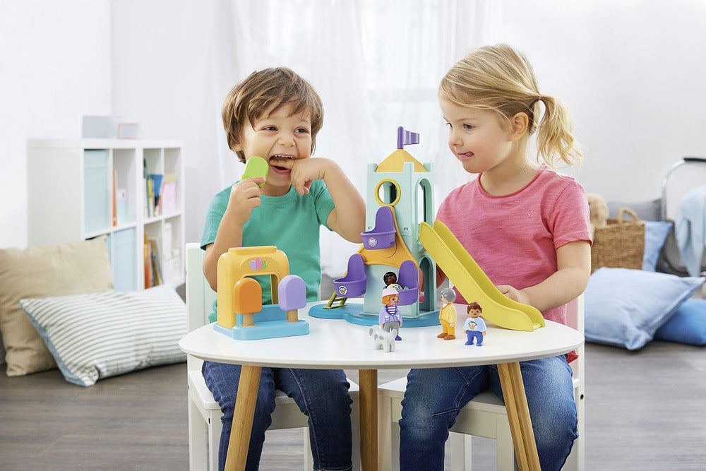 Playmobil playset figures dog and family-friendly characters support cooperative play.