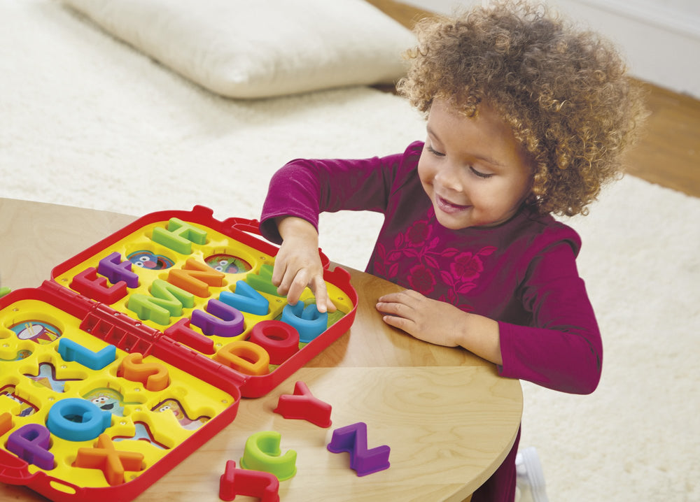 Playskool Elmo's On the Go Letters travel-ready set for learning anywhere.