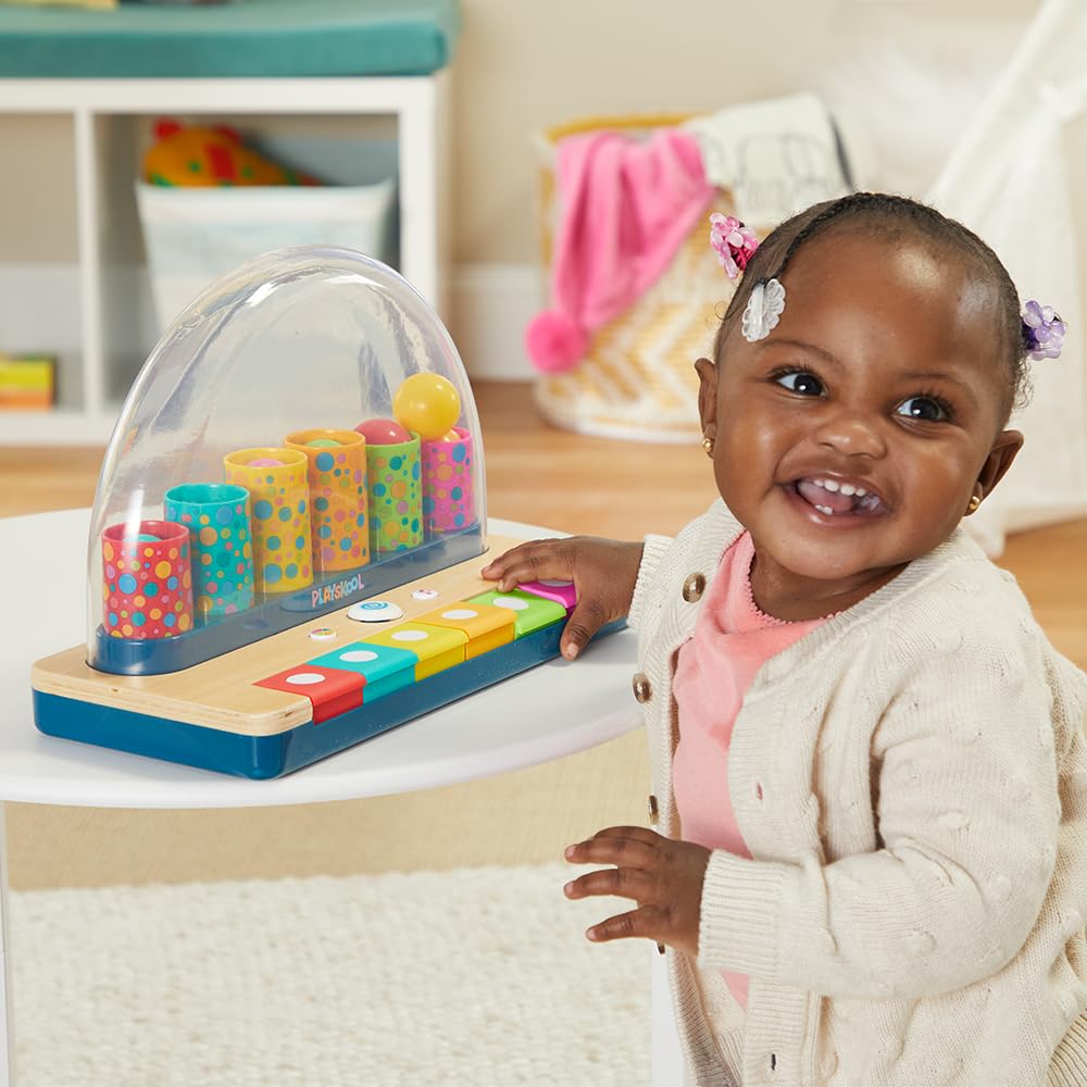 Playskool Little Wonders Pop-A-Tune key-press action demonstrating responsive play.