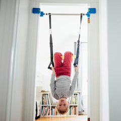 Playzone-fit Kidtrix Deluxe in-doorframe setup shown for secure installation.