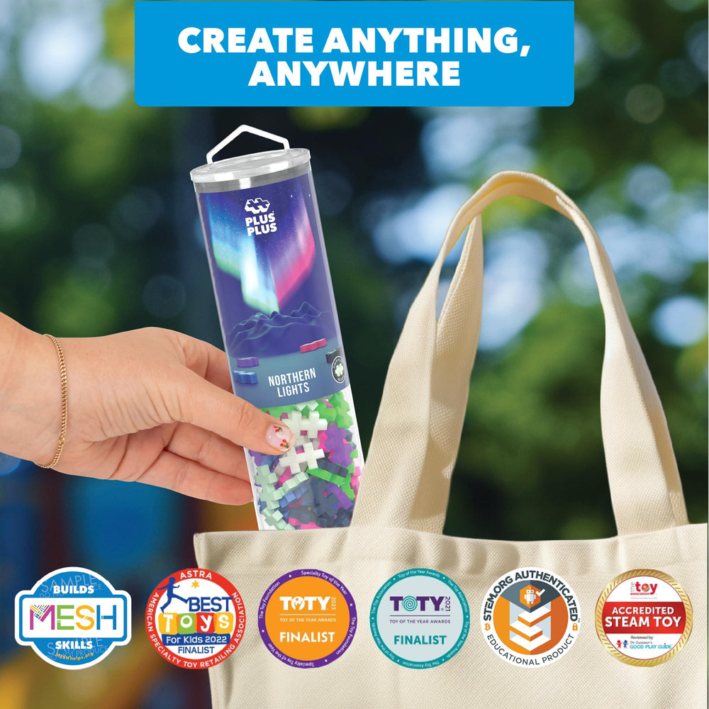 PLUS PLUS aurora-inspired colors enhance tactile and visual exploration.