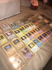 Pokémon 50-card pack with holo display and collection value