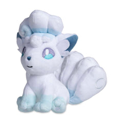 Pokémon Center Alolan Vulpix Sitting Cuties Plush sits upright on a desk or shelf.