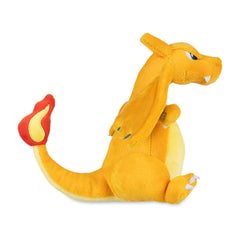 Pokémon Center Charizard Sitting Cuties Plush on desk, charming display for a playful workspace.
