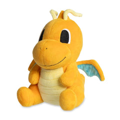Pokémon Center Dragonite Dolls Plush on a desk, soft fabric for cosy display.