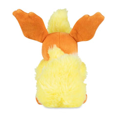 Pokémon Center Flareon Plush care instructions, surface wash to maintain color.