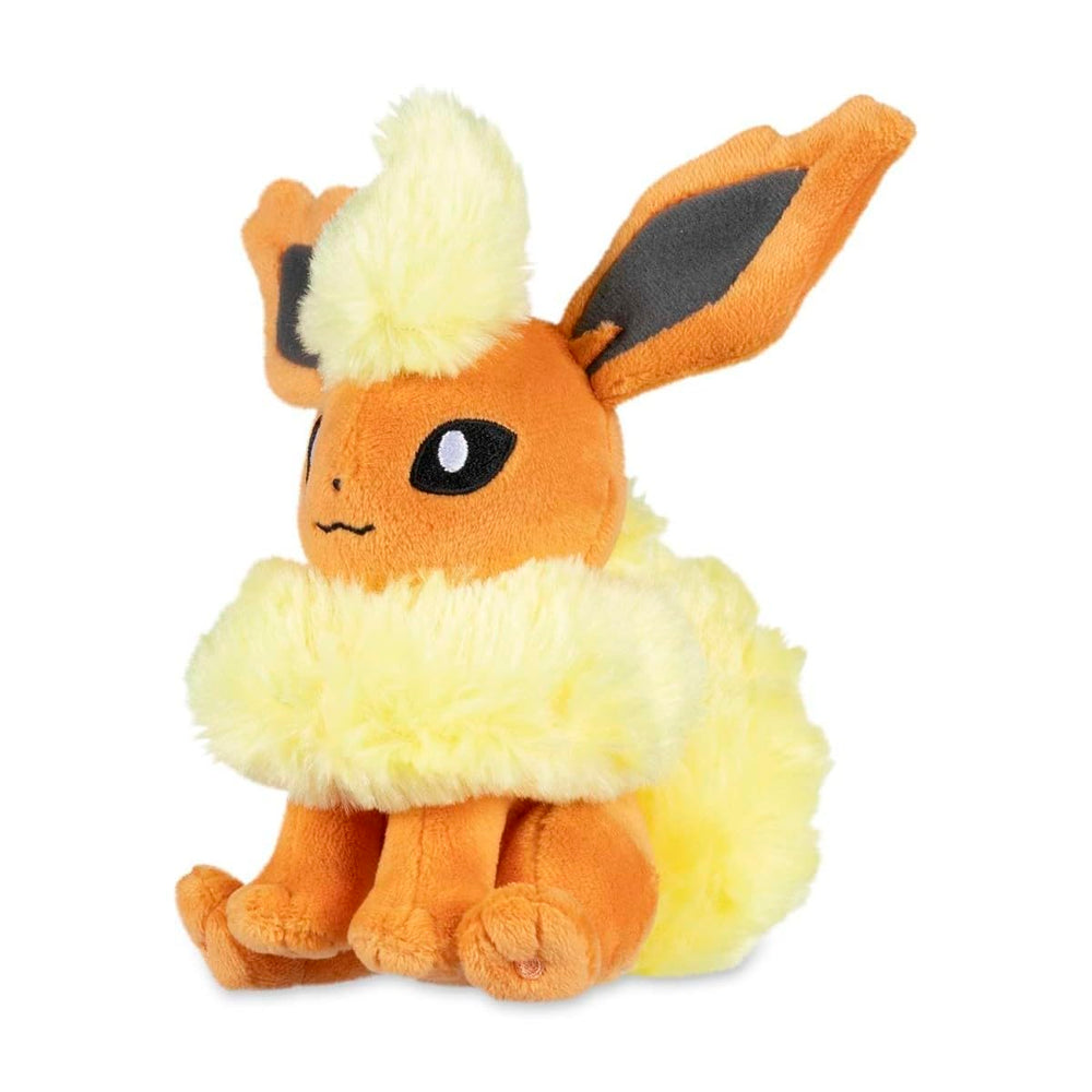 Pokémon Center Flareon Sitting Cuties Plush front view, weighted to sit upright on a desk.