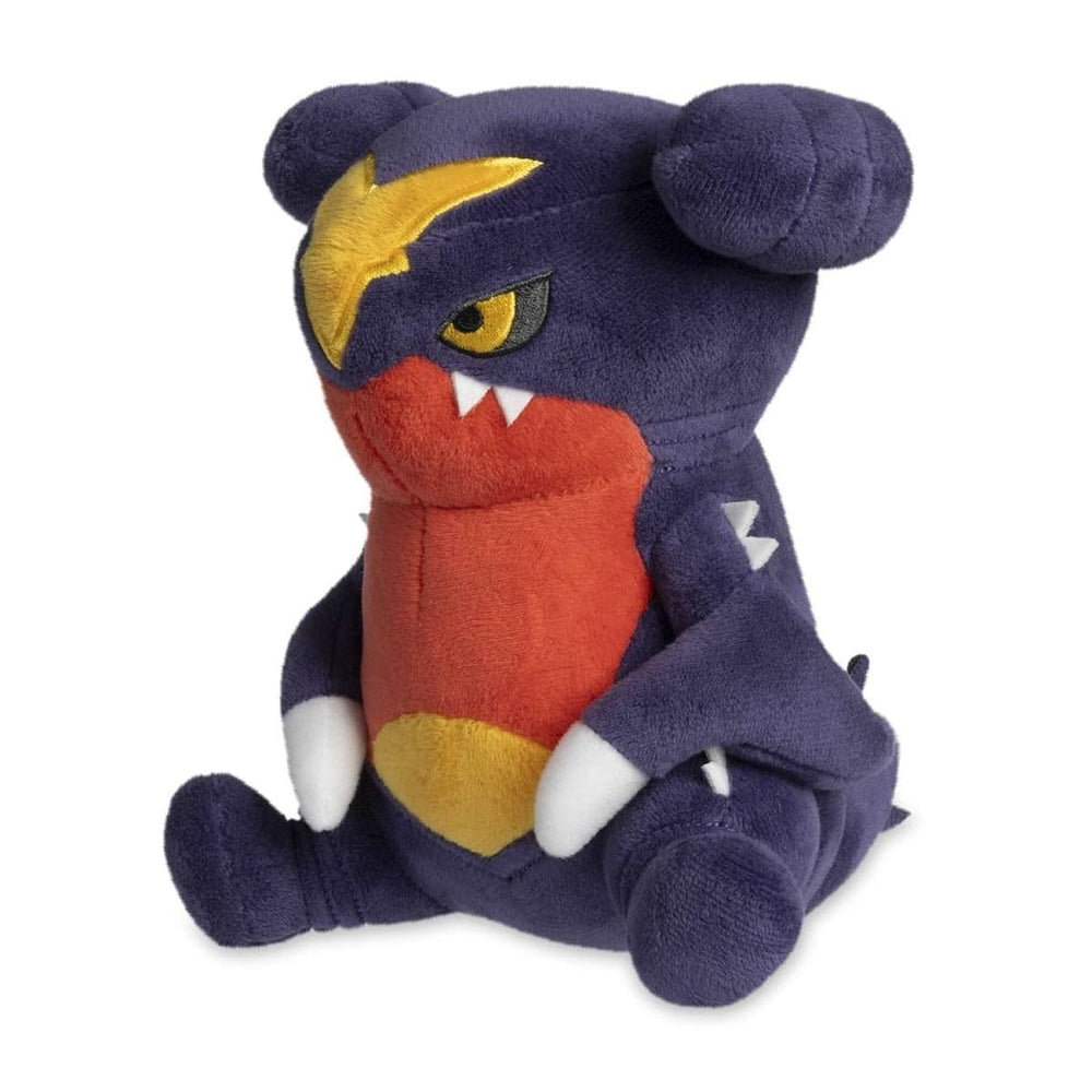 Pokémon Center Garchomp Dolls Plush on-desk setting demonstrates easy care with surface wash.