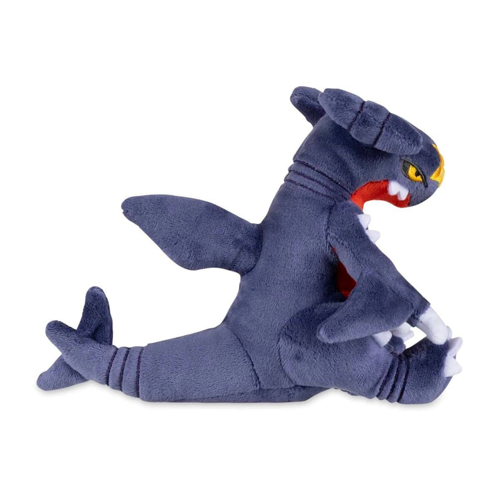Garchomp plush fabric close-up shows soft polyester weave and cozy touch.