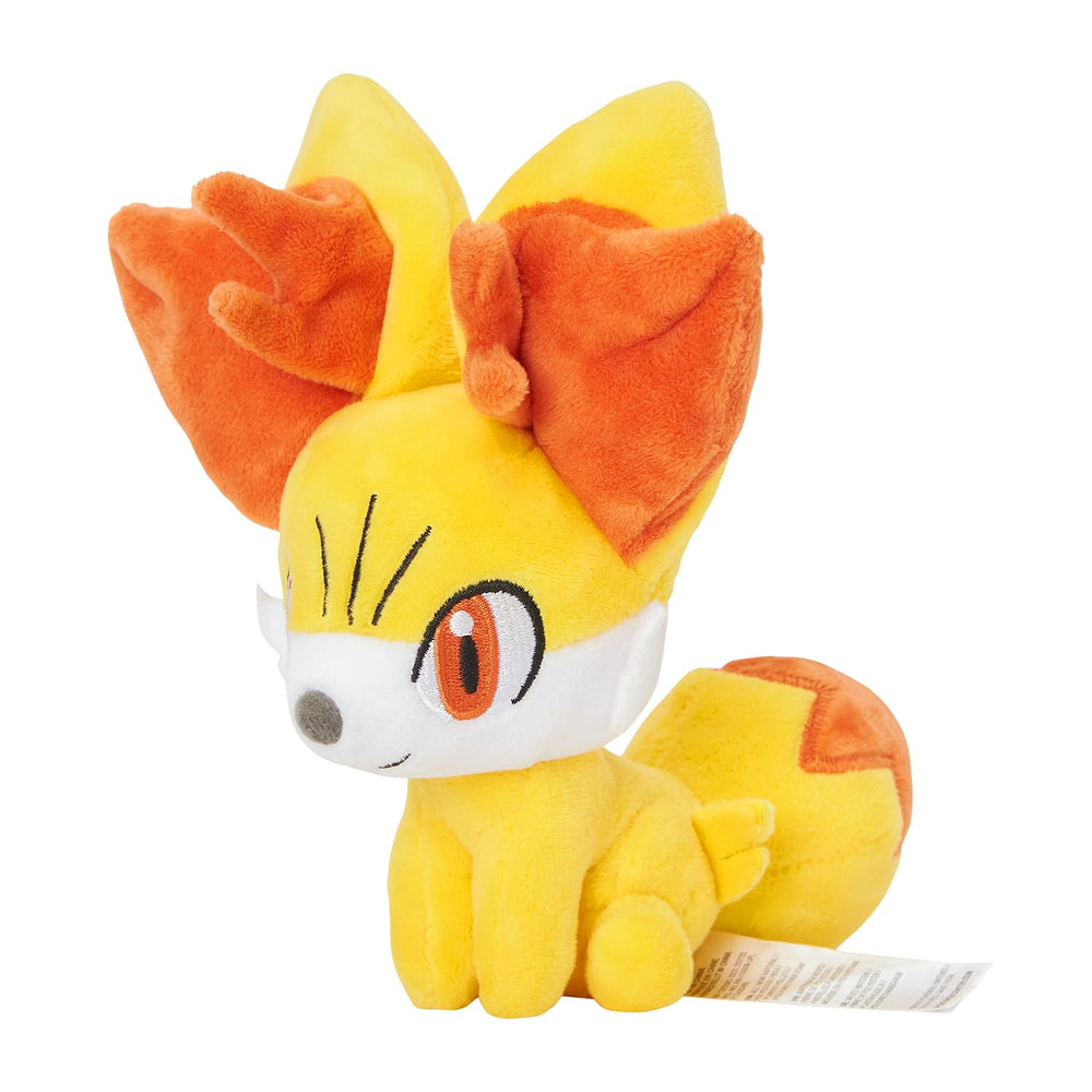 Fennekin Sitting Cuties plush from Pokémon Center weighs with microbeads for upright posture.