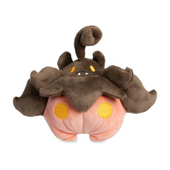 Pokémon Center Pumpkaboo Sitting Cuties plush shown on a shelf with charm.