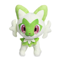 Pokemon Center Sprigatito plush close-up shows embroidered head and face.