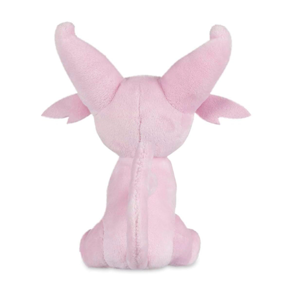 Espeon Sitting Cuties Plush on a shelf, a charming desk companion.