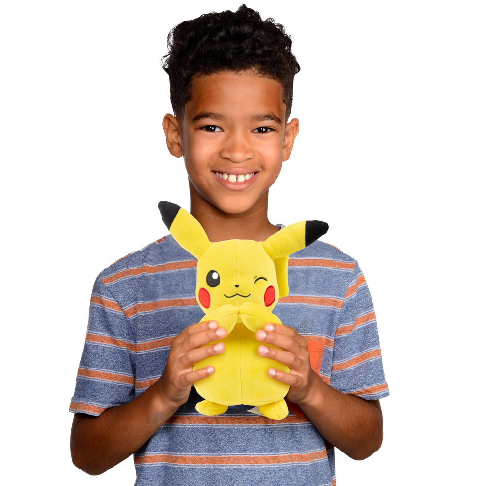 Kids enjoy imaginative play with Pokémon Eevee and Pikachu plush.