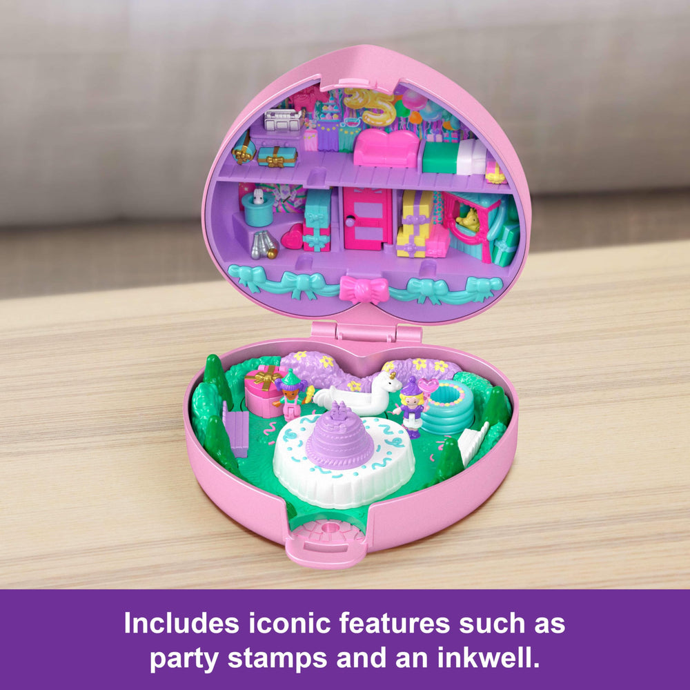 Polly Pocket birthday cake opens to an inkwell, charming journaling touch.