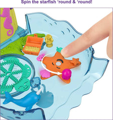 Polly Pocket Bubble Aquarium mermaid doll captivates with twinkling colors and imaginative adventures