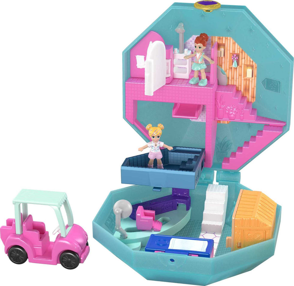 Polly Pocket Pamperin Perfume Spa compact opened to reveal a spa world for imaginative play