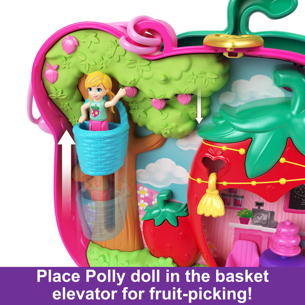 Polly Pocket spinning strawberry field for interactive fruit gathering and storytelling.