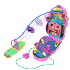 Polly Pocket two-floor house with daybed and dining table for cozy play.