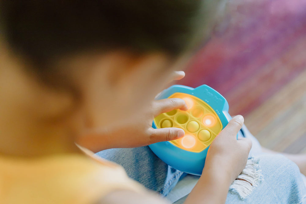 Pop It! Pro blue and yellow colors brighten playtime.