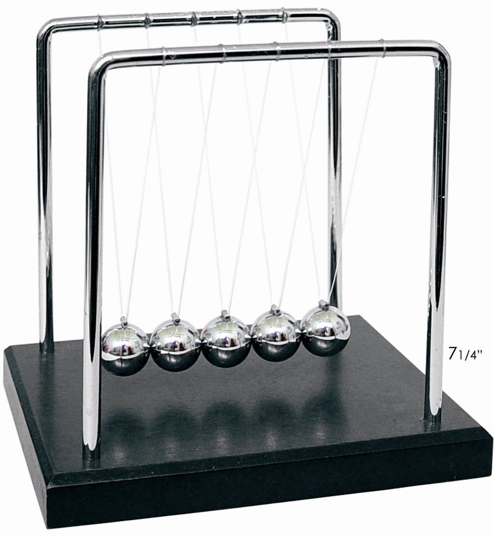PowerTRC Newtons Cradle balance balls showing momentum transfer on a stylish desk.
