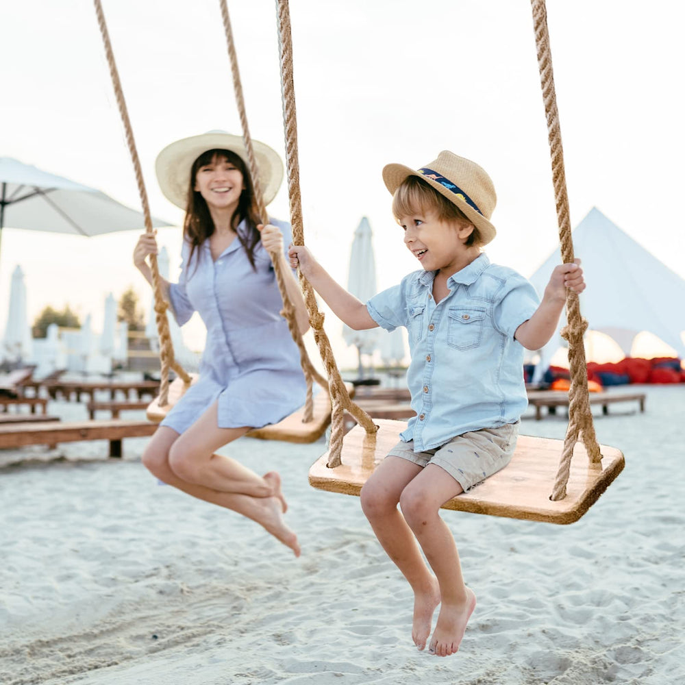 Premkid family-friendly backyard swing set in sunny garden setting.