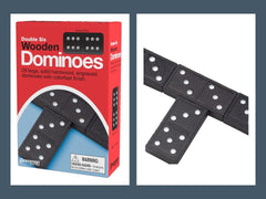 Hands arranging Pressman dominoes during a game for social play.