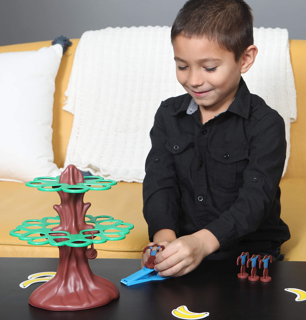 Pressman Jumpin' Monkeys catapults and monkeys ready for fast-paced play.