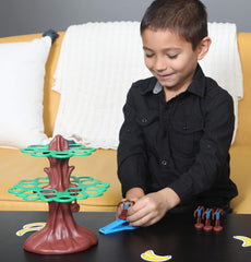 Pressman Jumpin' Monkeys catapults and monkeys ready for fast-paced play.