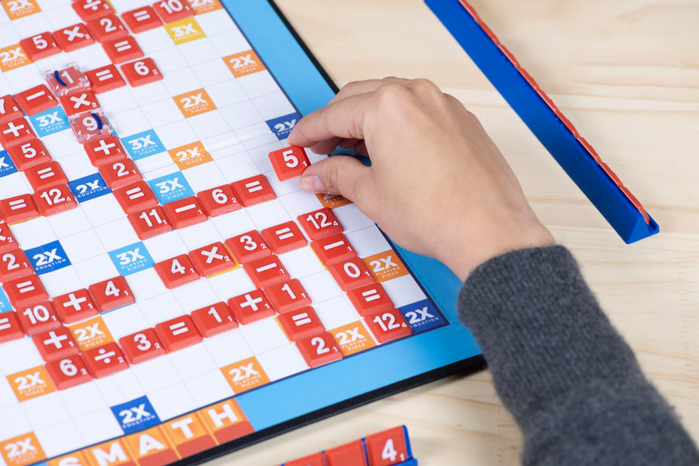 Smath pieces spread across the grid for quick equation-building.