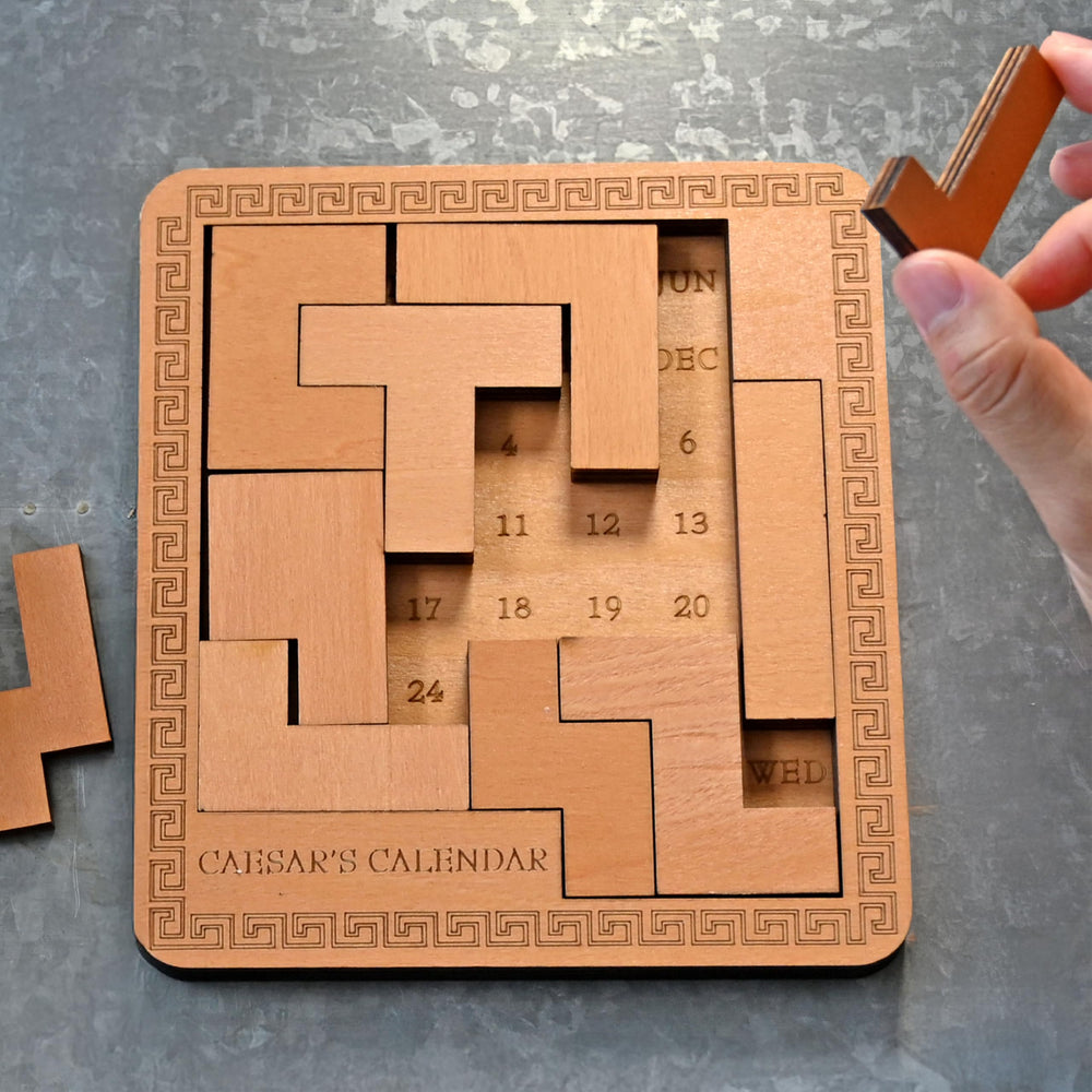 Project Genius Caesar's Calendar laser-engraved wood construction adds premium desk appeal.