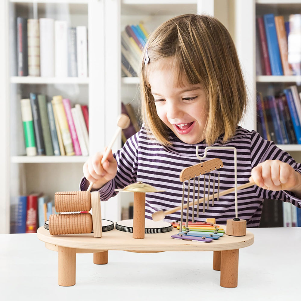 Promise Babe durable wooden platform keeps instruments organized during play.