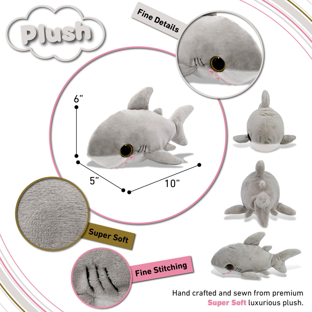 Puzzled plush shark face closeup highlights soft fabric and friendly smile.