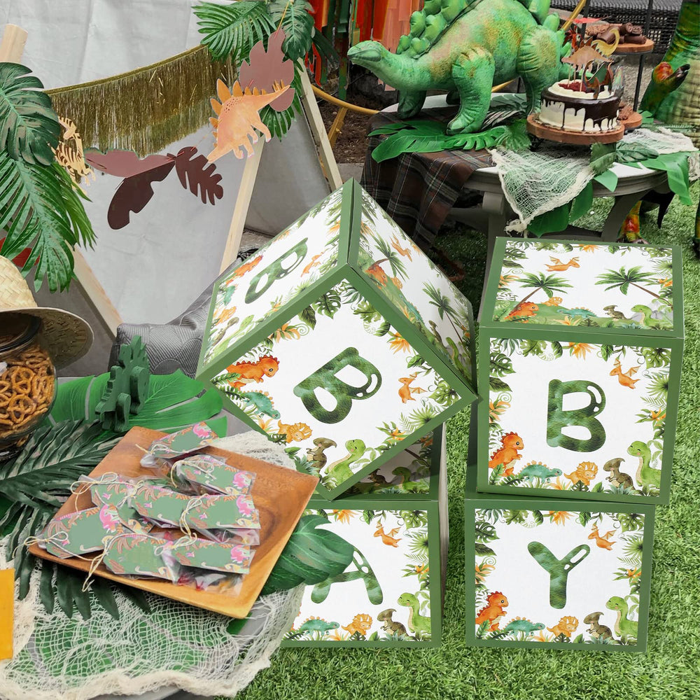 QIFU dinosaur boxes with cute dinos used as party photo backdrop