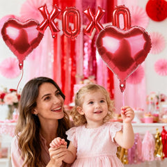 QIHOMPIB Valentines balloon set displayed as wall decor and photo backdrop.