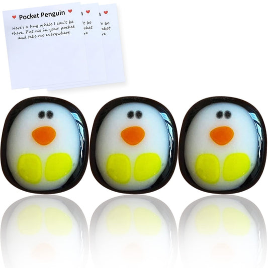 Qitiieli pocket penguin hug in resin, tiny and portable for on-the-go comfort.