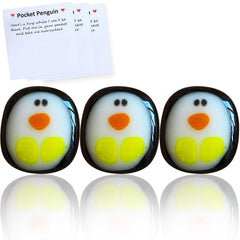 Qitiieli pocket penguin hug in resin, tiny and portable for on-the-go comfort.