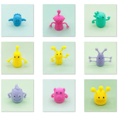 Qiuttnqn monster stretchy finger puppets soft texture close-up highlighting skin-friendly material for gentle play.