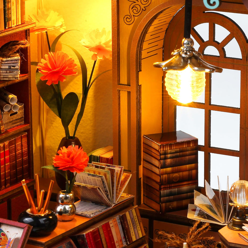 Quanquer wooden dollhouse scene with candles evokes warm reading corner.