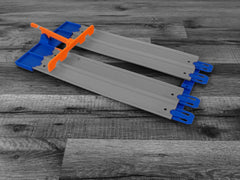 QuirkWorks 3D Track Spacers on orange Hot Wheels track showing reliable performance.