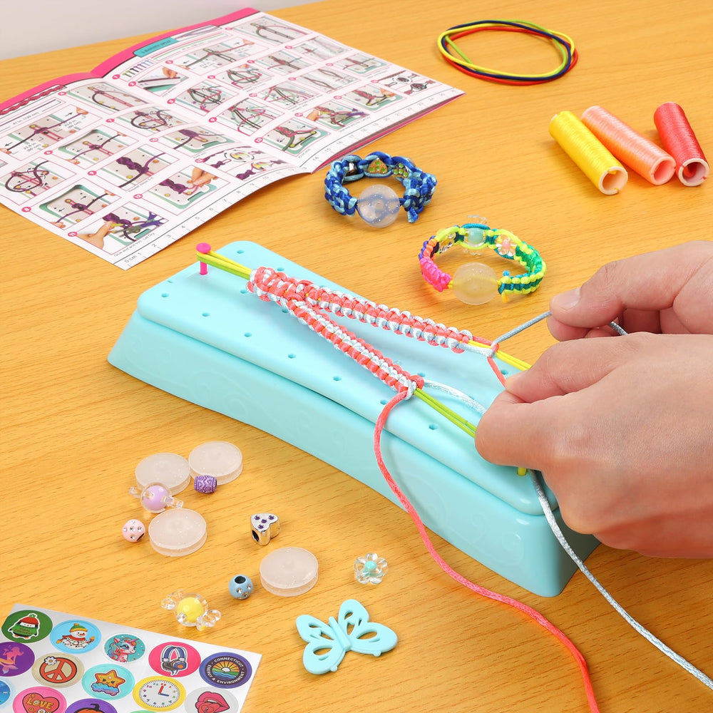 QXHOL bracelet thread spools and tools for easy, kid-friendly crafting.