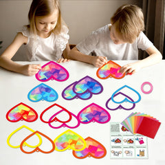 Qyeahkj finished heart suncatchers brighten a window with color.
