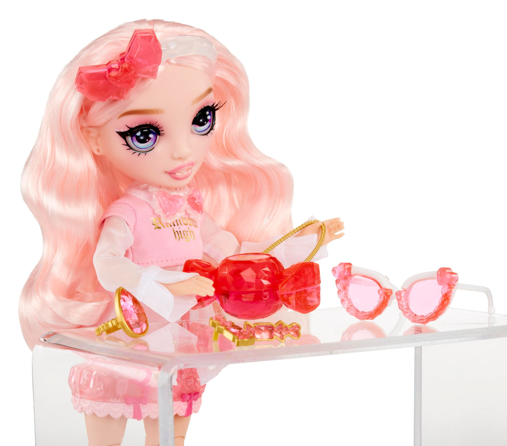 Rainbow High Bella doll posing with crystal accessories for imaginative storytelling