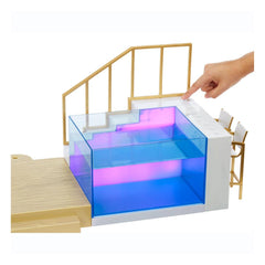 Rainbow High marble counter with recessed slots anchors the juice bar.