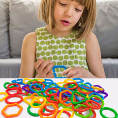 RAINBOW TOYFROG geometric shapes enable quick stroller attachments and versatile on-the-go play.