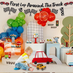 RANERVZ race car sign first birthday banner complements the race theme