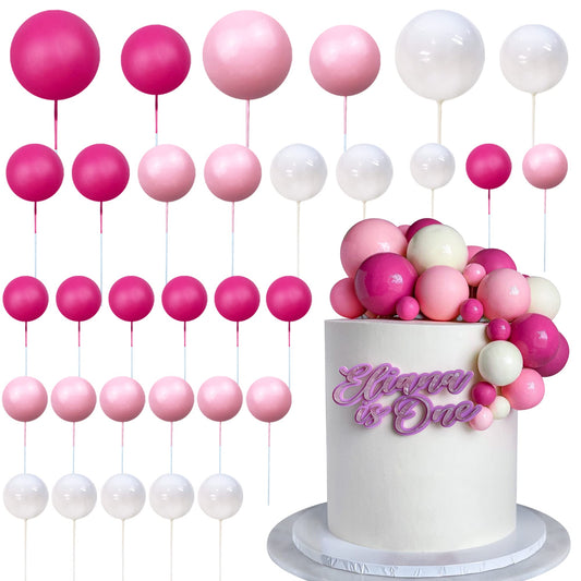 RASSLISA ball cake topper in pink adds festive color to cupcakes.