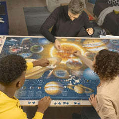 Ravensburger Space Odyssey 5000-piece puzzle border highlights distances and missions for educational appeal