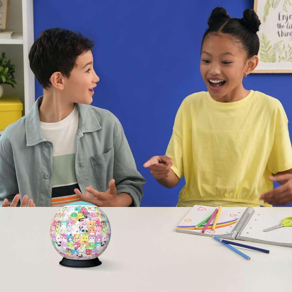 Ravensburger Squishmallows 3D Puzzle Ball on desk, ideal decoration for fans.