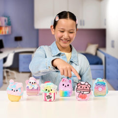 REAL LITTLES Rainbow Pupcorn backpack shows scented mini surprises for on-the-go fun.